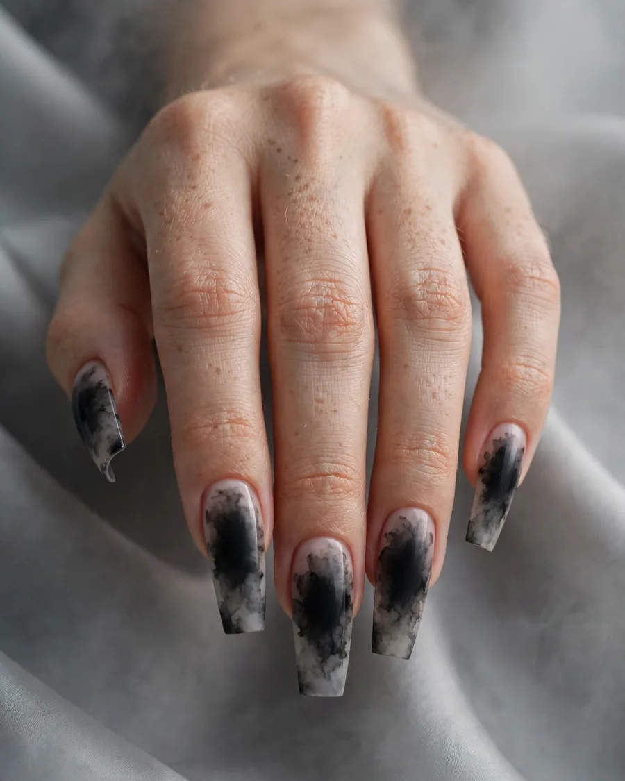 Smoky black aura nails fading to charcoal gray