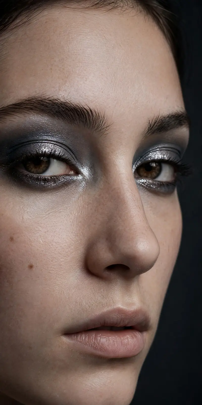 Cool gunmetal grey smoky eye with silver shimmer, 90s inspired fall eye makeup 2026